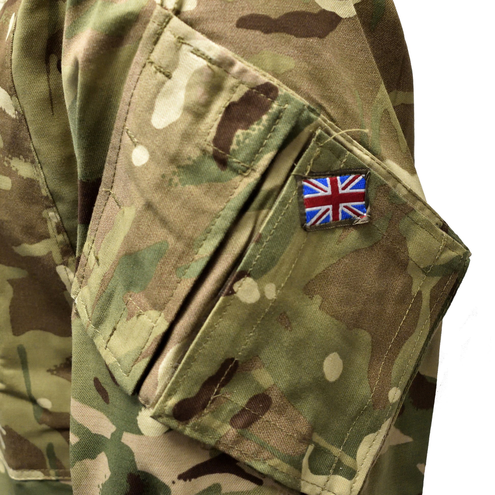 Macro image of Union Jack badge stitched on British Army Warm Weather Combat Jacket "2" in MTP camouflage.