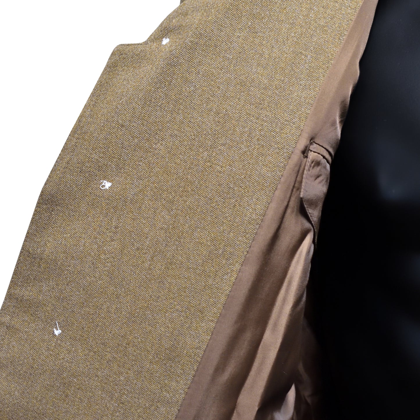 Close-up of interior lining and button holes on British Army Dress Jacket without buttons.