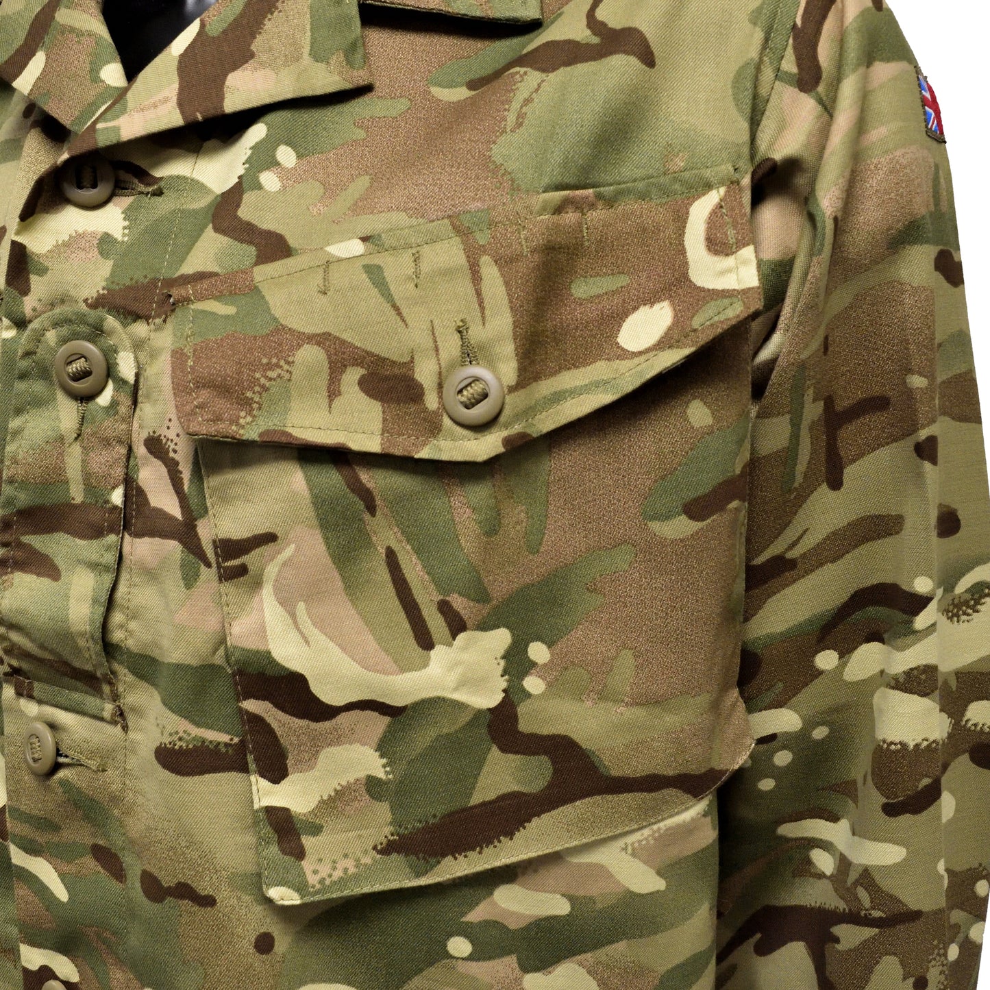 Close-up of front pocket and button on British Army MTP Barrack Shirt, showing durable construction.