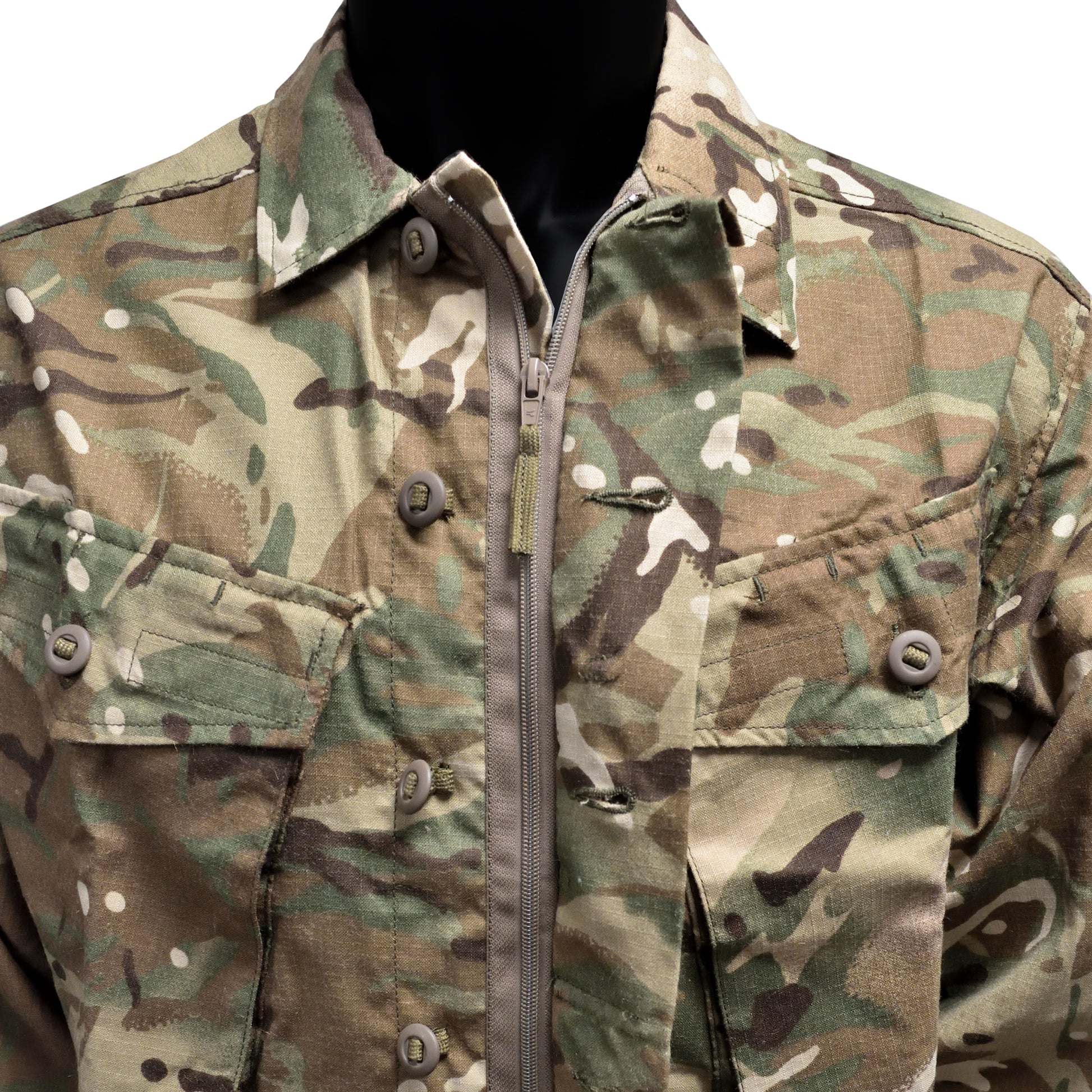 Close-up of chest closure system on FR Combat Jacket.
