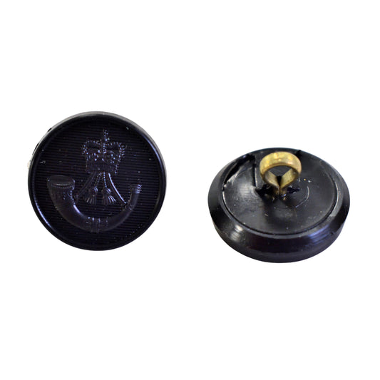 Detailed shot of Firmin & Sons black moulded buttons with shank fitting