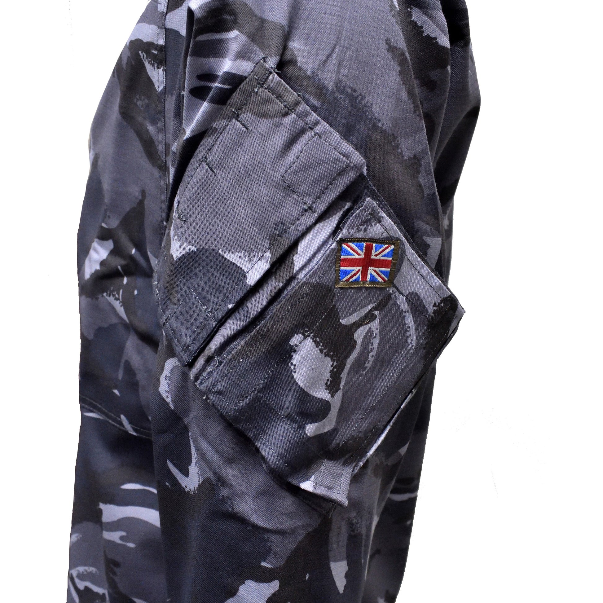 Close-up of Union Jack flag patch stitched on British Army Combat Jacket Blue Camo.