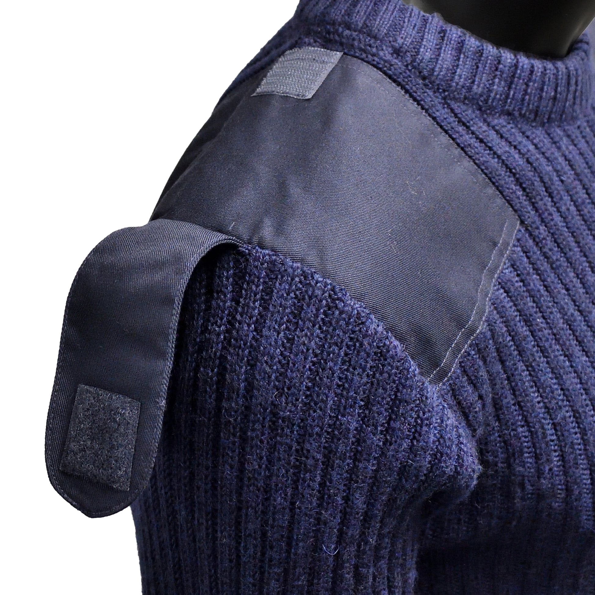Close-up of knit fabric texture on Round Neck Utility Jumper Navy Blue.