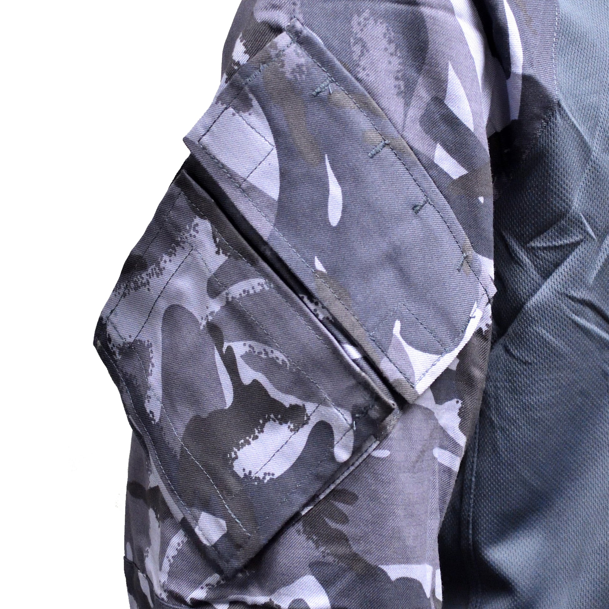 Detailed shot of sleeve pocket and stitching on British Army UBACS EP Shirt Blue Camo.