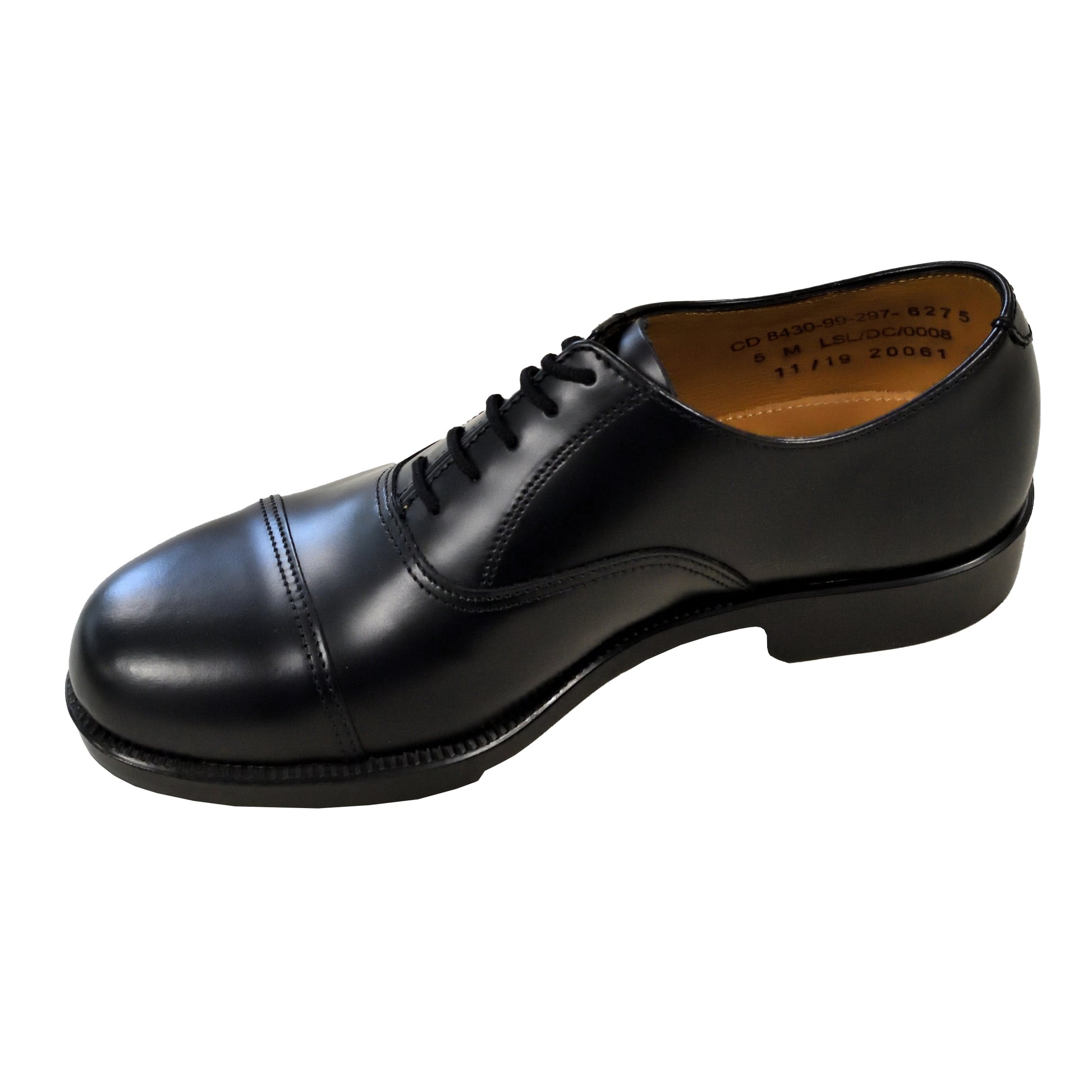 Side profile of black leather service shoes showing clean toe cap line and low heel.